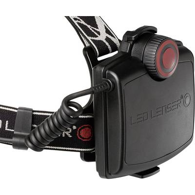 Boîtier noir pour pile LED Lenser avec bouton rouge, fixé sur un bandeau frontal noir à motif blanc et connexion par câble.