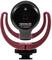 Un microphone noir dans un support rouge portant l'inscription 'VIDEOMIC GO' et 'MADE IN AUSTRALIA'.