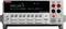 Un Keithley 2401 SourceMeter indique une résistance de +100,143 Ω à un courant de 10,0000 mA. Touches de commande et connexions visibles.