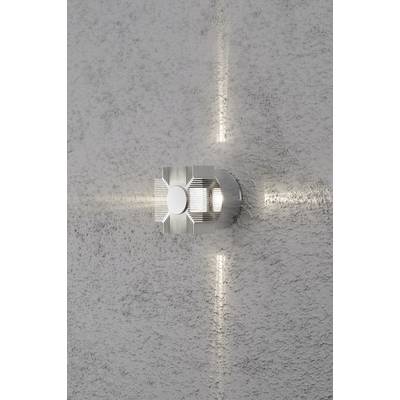 Lampe fixée au mur, projetant de la lumière dans quatre directions, design métallique, apportant un éclairage élégant à un espace moderne.