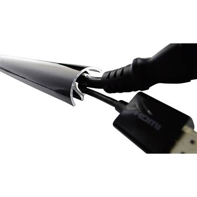Un câble HDMI est inséré dans un système de gestion de câbles élégant et brillant qui regroupe les câbles de manière ordonnée.