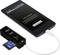 Smartphone connecté à un lecteur de carte via un câble USB, la carte SD est reconnue. L'écran affiche « USB connecté » et l'accès au stockage.