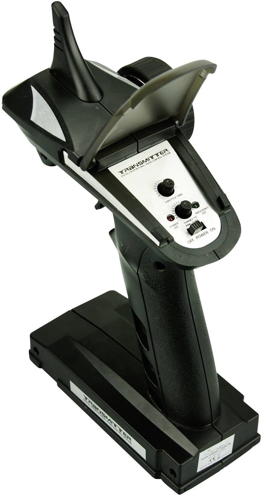 Une télécommande noire avec antenne et boutons de commande, utilisée pour piloter des modèles télécommandés.