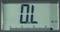 Un affichage numérique indique '0.L' avec une échelle en dessous. À droite est inscrit 'M Ω', ce qui indique des mégaohms.