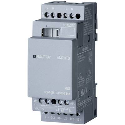 Un module électrique gris portant l'étiquette 'RUN/STOP AM2 RTD', faisant partie d'un système de commande industriel.
