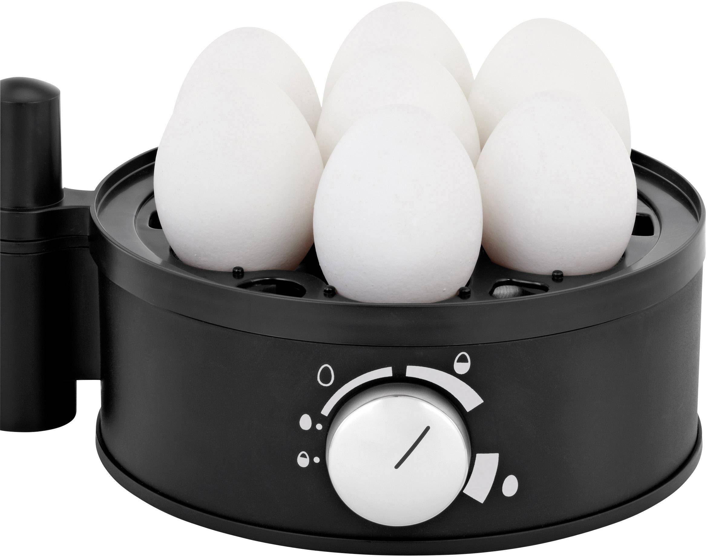 Six œufs blancs dans un cuiseur à œufs noir, avec un bouton rotatif réglant le temps de cuisson visible à l'avant.