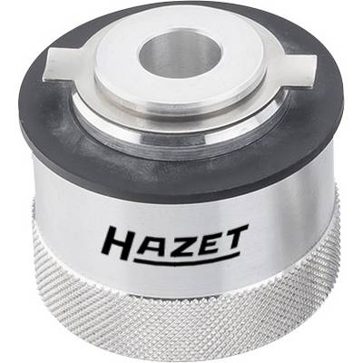 Outil métallique portant l'inscription 'Hazet', de forme cylindrique, avec base striée, probablement un embout ou un adaptateur spécial.