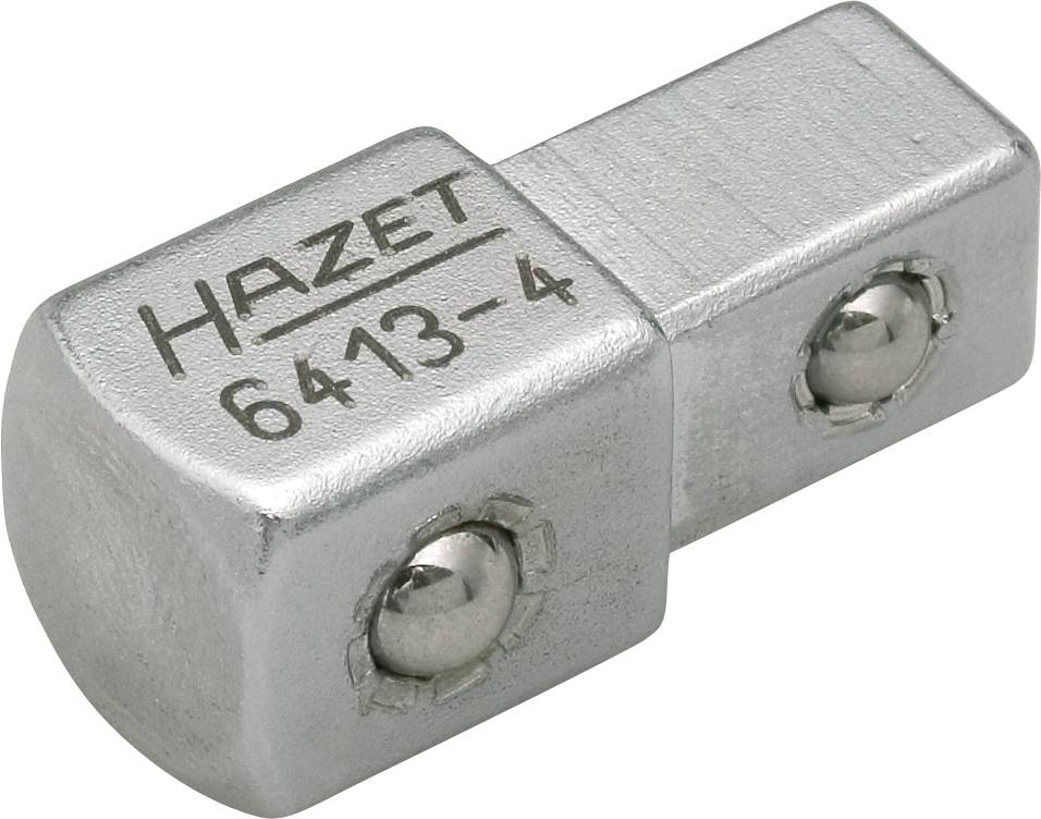Adaptateur métallique portant l'inscription 'HAZET 6413-4' avec deux vis visibles, probablement un accessoire pour outil ou machine.