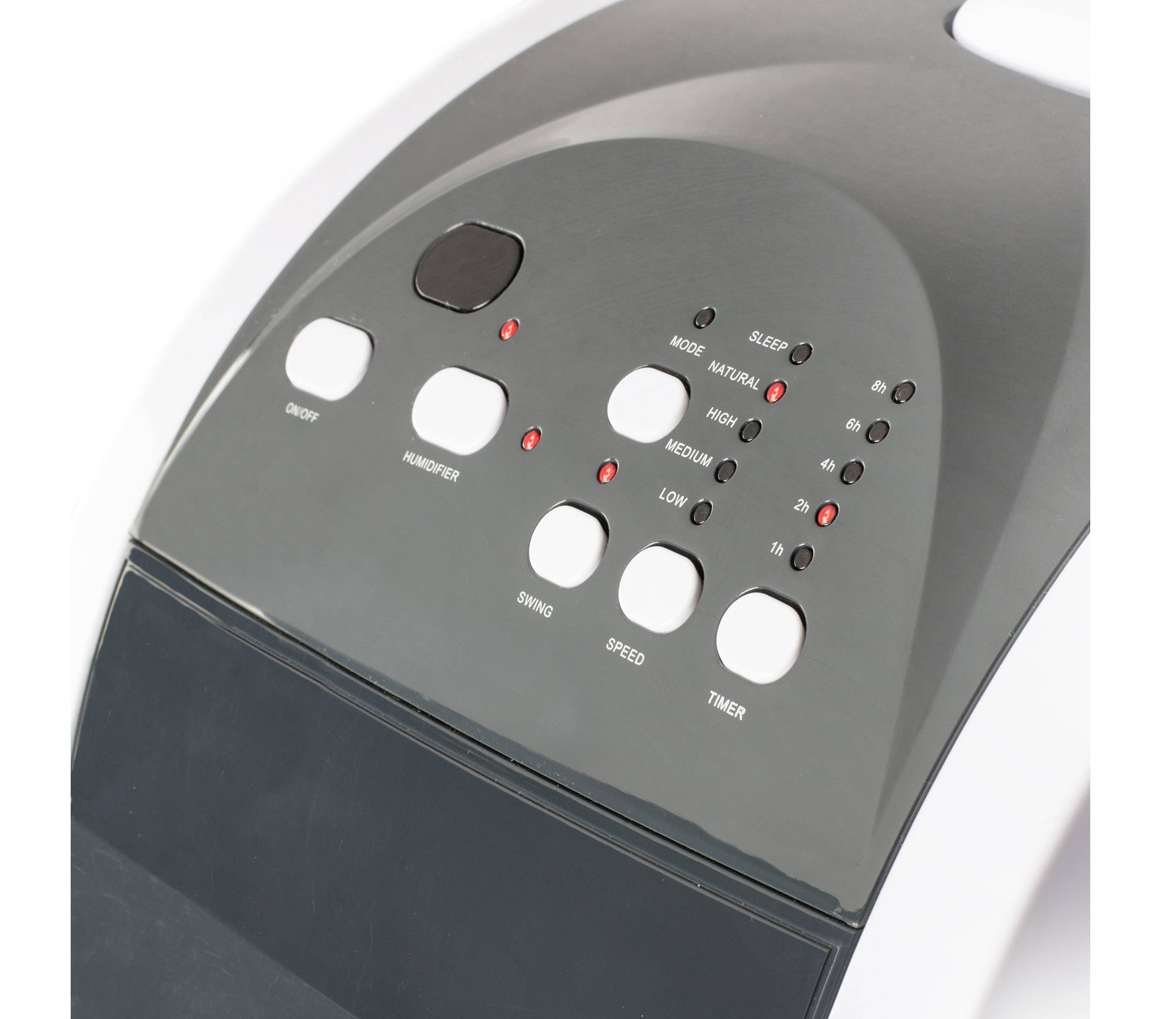 Panneau de commande d'un humidificateur avec des touches pour le mode, la vitesse, la minuterie, et des voyants LED indiquant le statut du mode et de la vitesse.