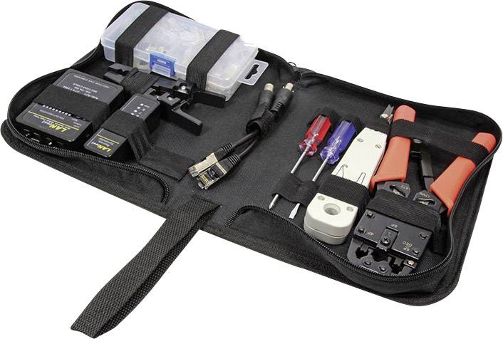 Ensemble d'outils dans un sac ouvert comprenant des pinces, des tournevis, des coupe-câbles et un testeur de câble réseau pour les réparations.