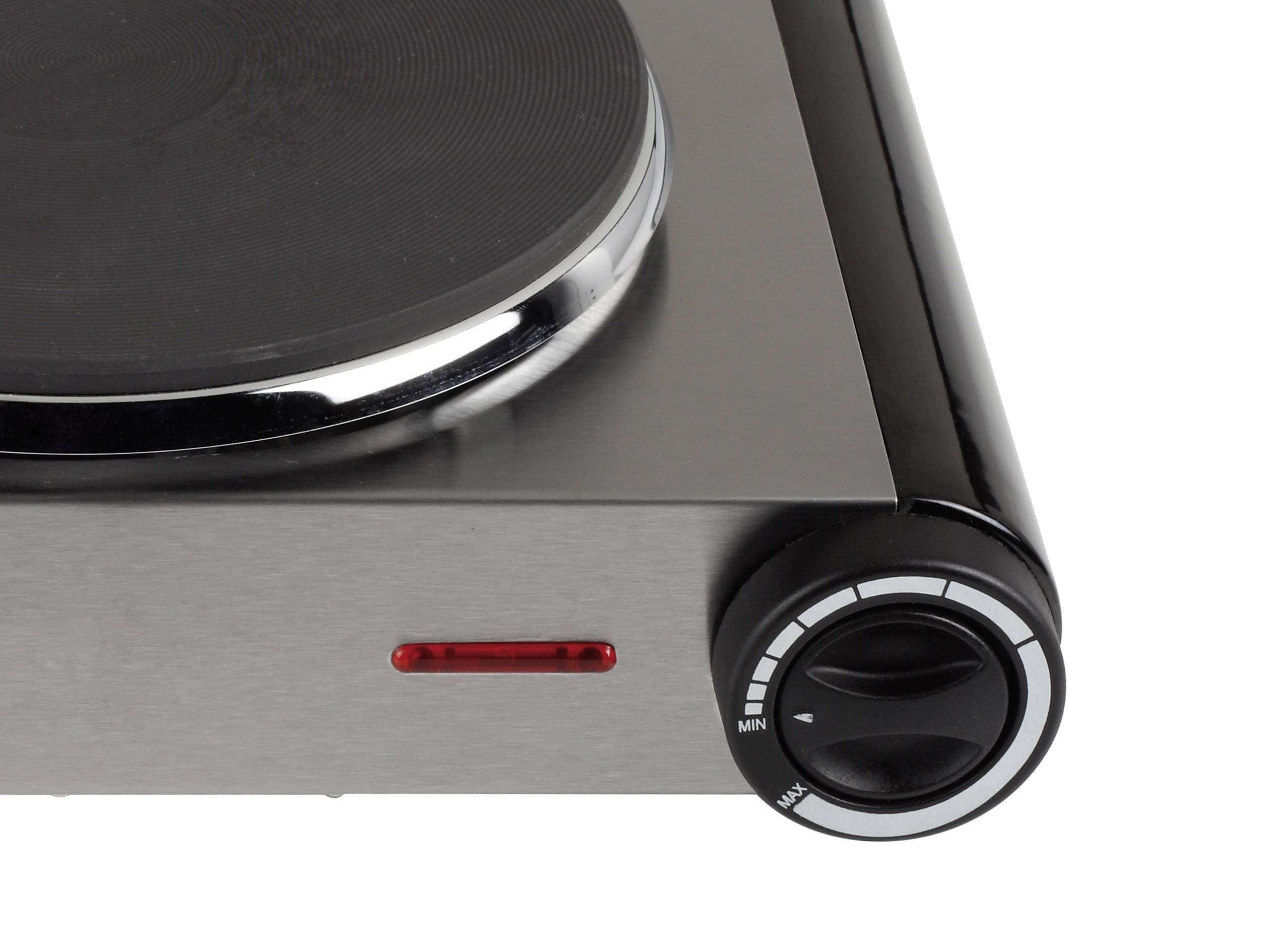 Plaque de cuisson électrique en acier inoxydable avec régulateur de température sur le côté droit.