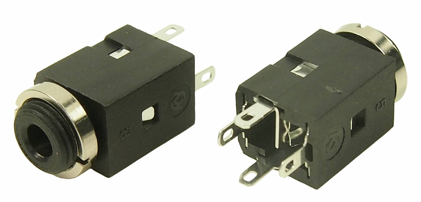 Deux prises jack noires avec anneaux métalliques et bornes de soudure, probablement destinées à des applications électroniques ou des appareils audio.