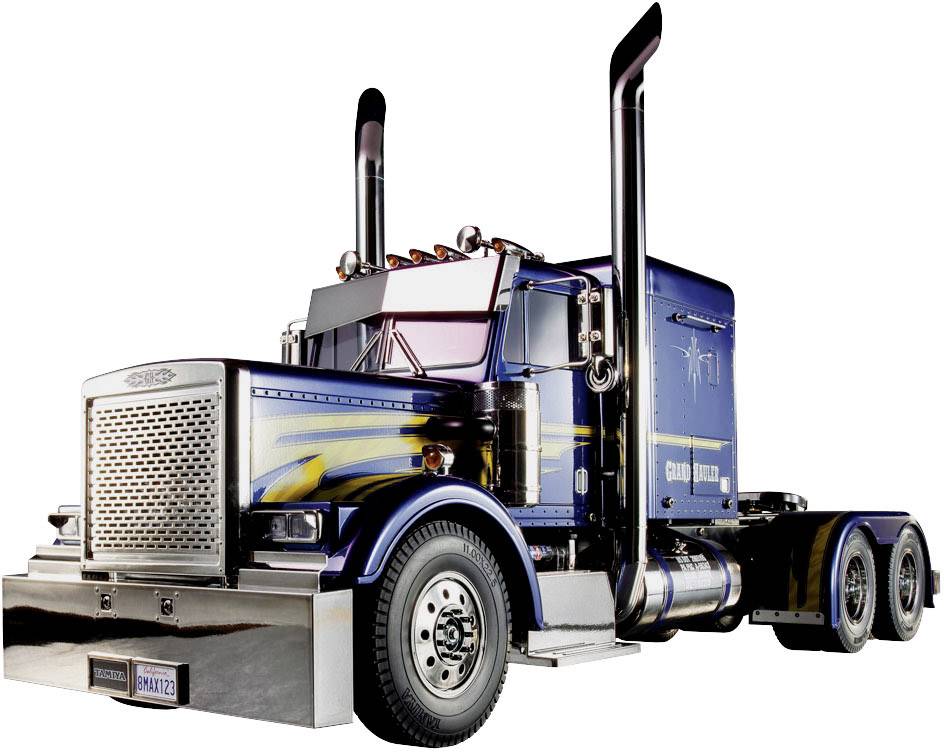 Camion bleu dans un style classique avec des accents métalliques et deux tuyaux d'échappement verticaux, vu de face.