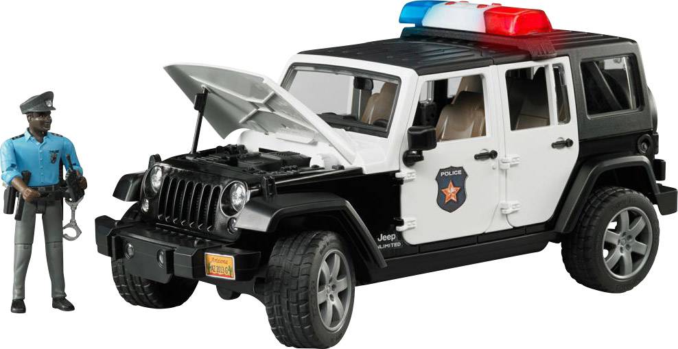 Une voiture de police jouet avec un capot ouvert et une barre lumineuse. À côté se trouve une figurine de policier avec des menottes.