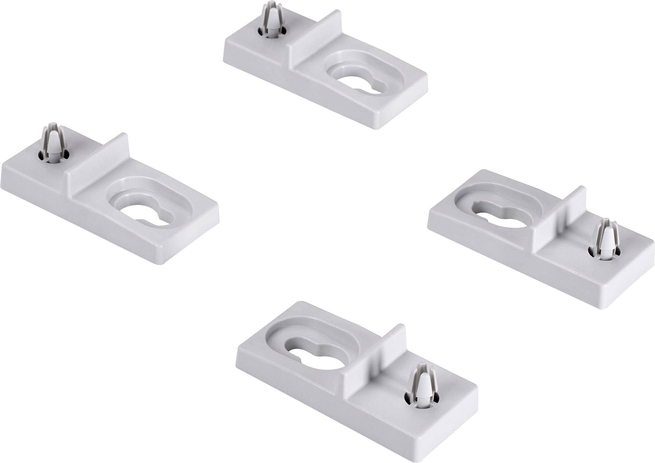 Quatre socles en plastique blanc avec des attaches de fixation, disposés de manière symétrique. Ils sont utilisés pour fixer des objets tubulaires.