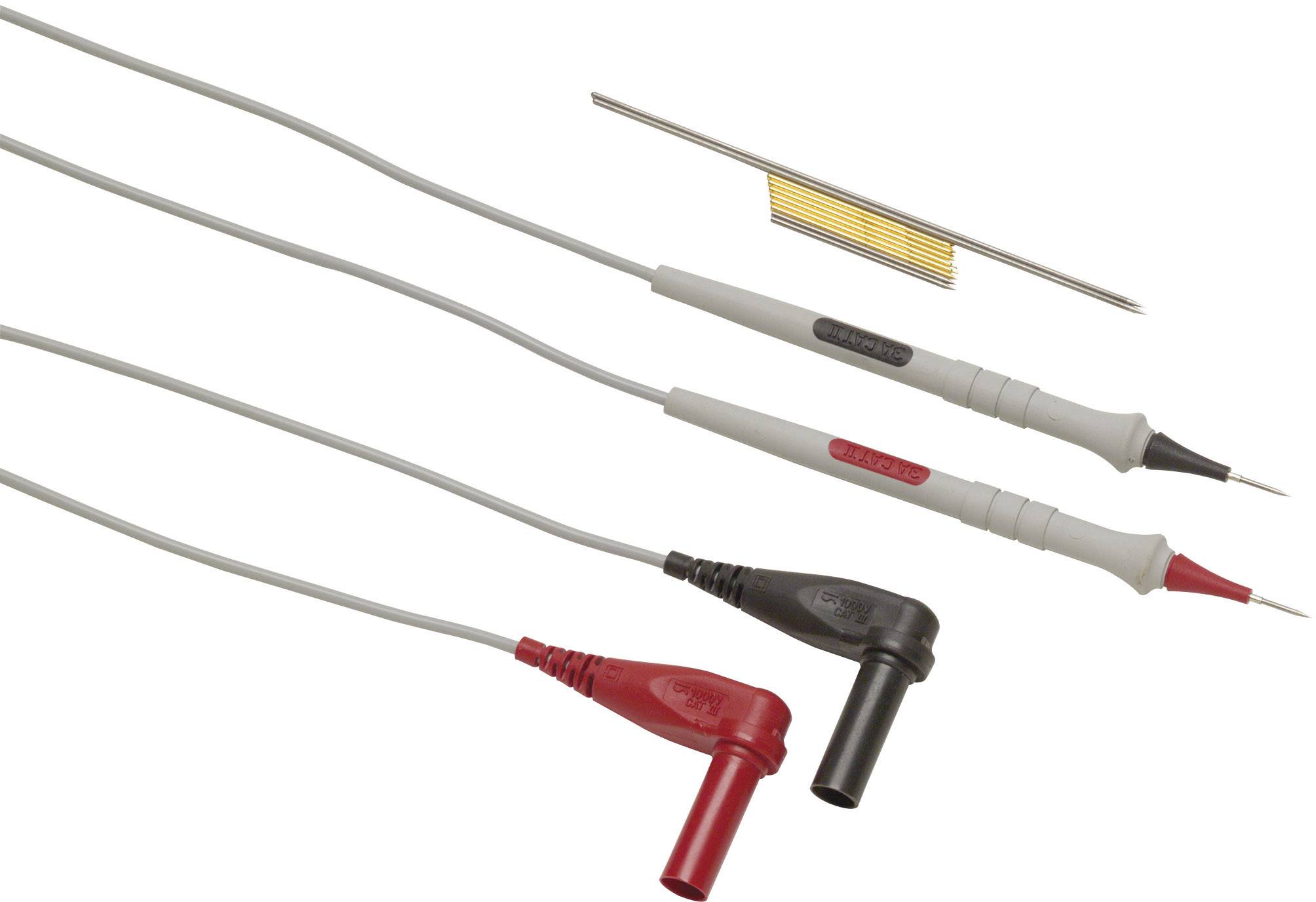 Pointes de test grises avec fiches noires et rouges pour mesures électriques, avec une aiguille métallique à détail jaune située au-dessus.