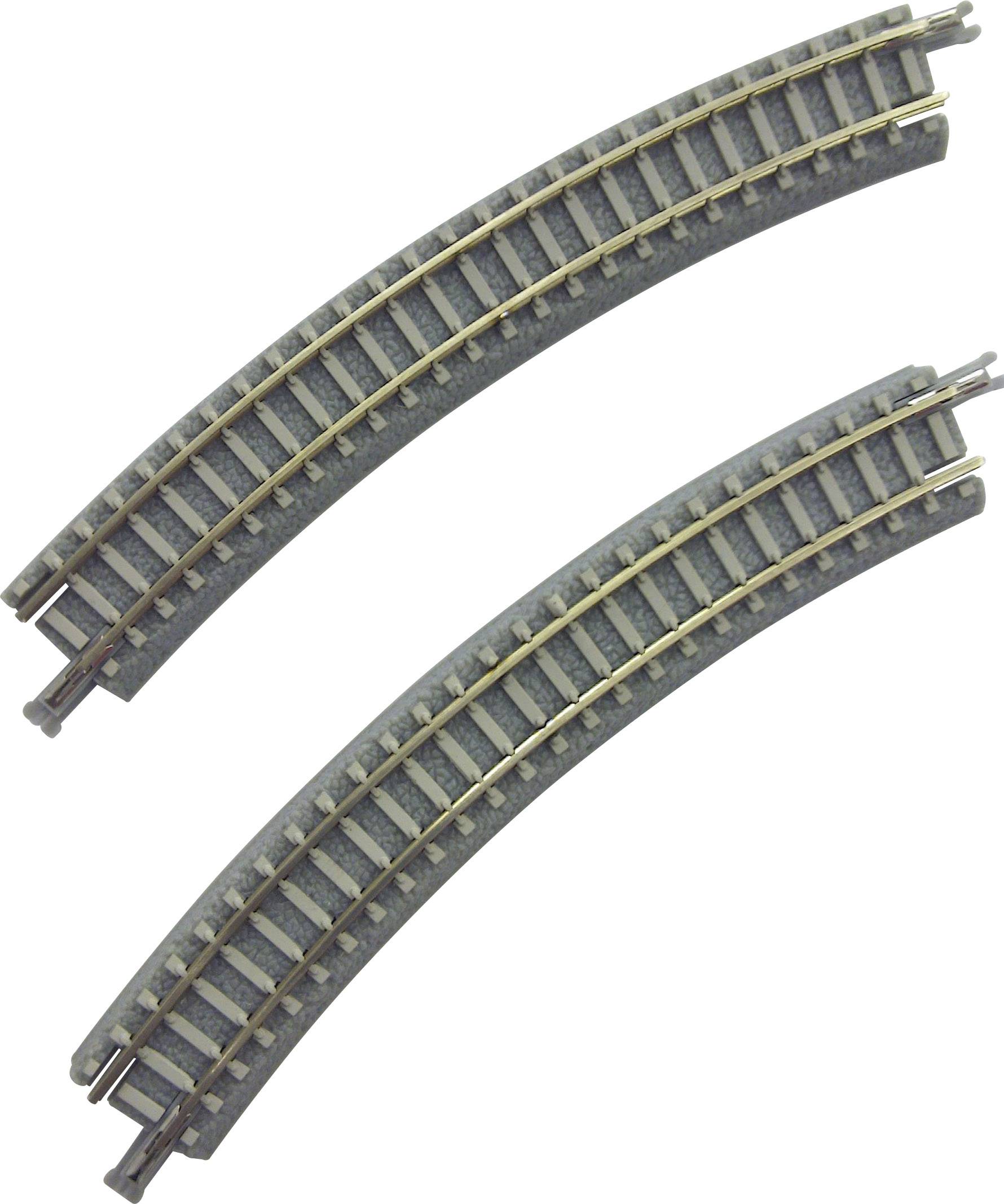Deux rails de chemin de fer miniature courbés disposés en parallèle.