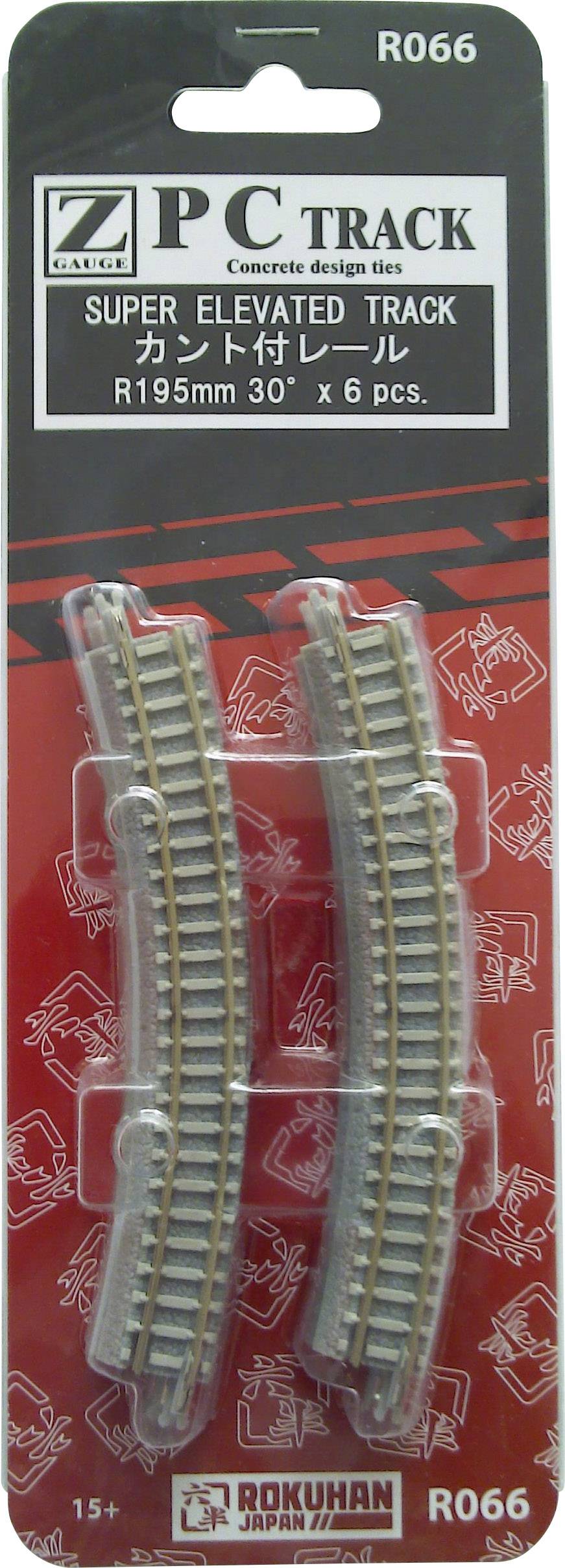 Emballage contenant deux rails de chemin de fer miniature courbés, étiquetés 'PC TRACK' et 'SUPER ELEVATED TRACK'. Marque 'Rokuhan'.