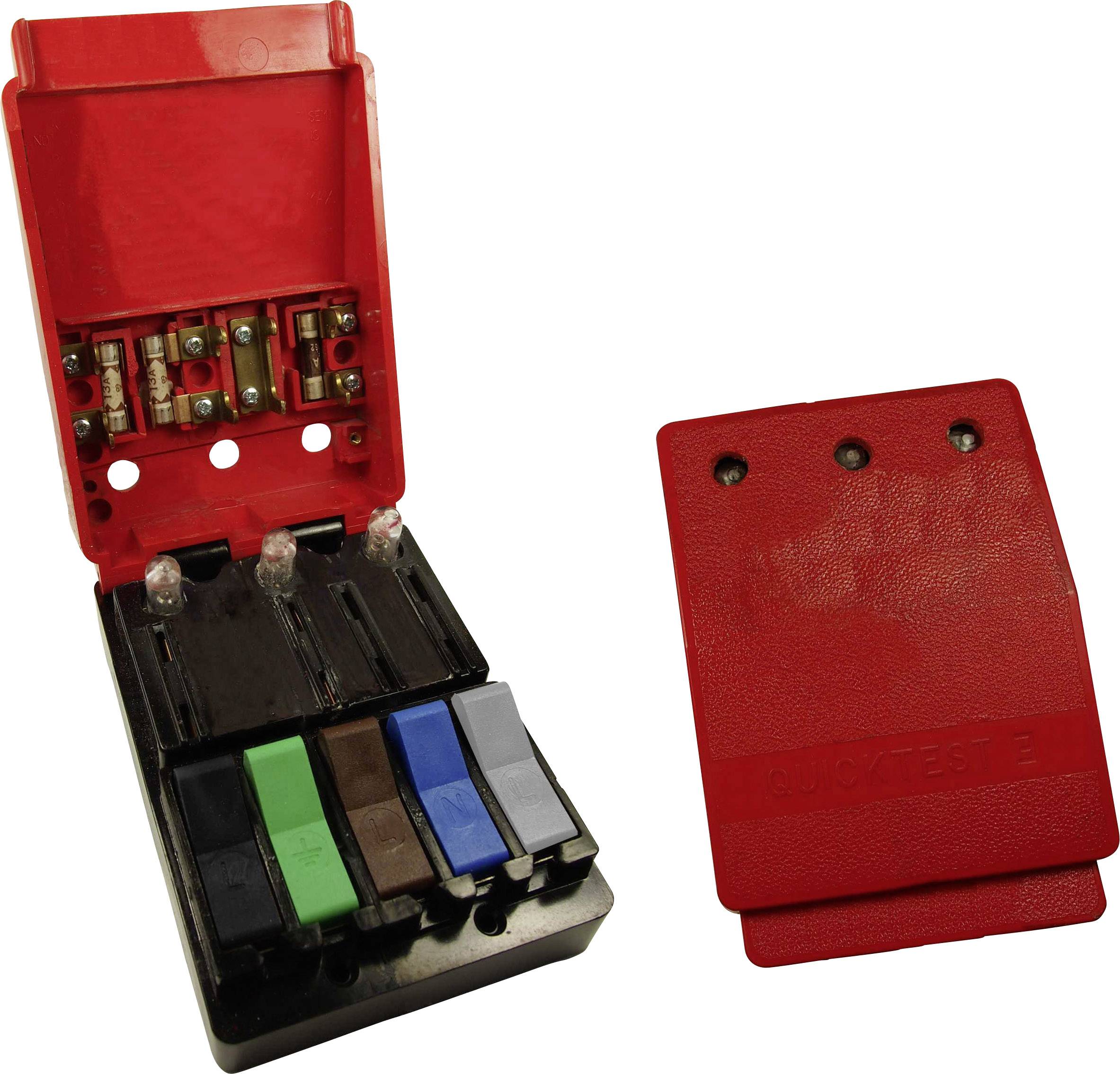 Un porte-fusible ouvert avec cinq fusibles différents en rouge, vert, bleu, noir et gris.