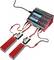 Un chargeur de la marque Voltcraft avec deux batteries connectées. Les écrans affichent des informations de charge pour des applications de modélisme.
