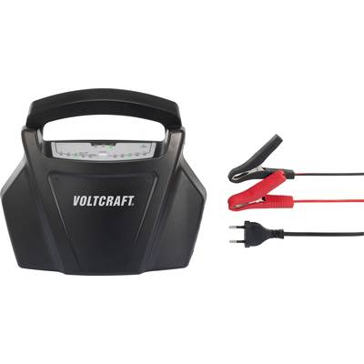 Un chargeur de batterie noir de Voltcraft avec deux pinces et une fiche européenne. Des voyants LED indiquent l'état de charge.