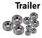 Plusieurs billes de roulement métalliques de différentes tailles sont posées sur une surface blanche. En haut se trouve le texte 'Trailer'.