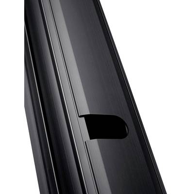 Surface métallique noire avec une ouverture en forme de fente, qui pourrait faire partie d'un appareil ou d'un meuble.