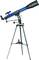 Un télescope bleu sur un trépied noir, idéal pour l'observation des étoiles. Le nom 'Bresser' est visible sur le télescope.