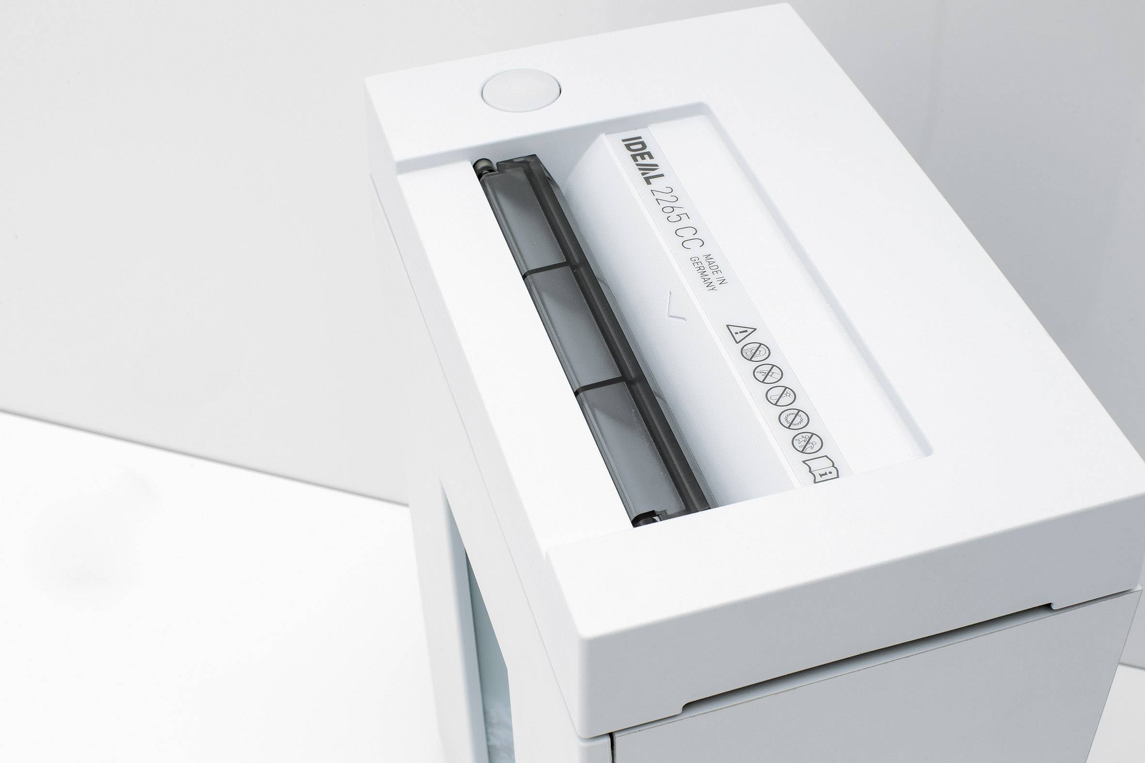 'Destructeur de documents-ID : 250 CC' dans un boîtier blanc, avec bac d'alimentation et symboles de guidage papier.