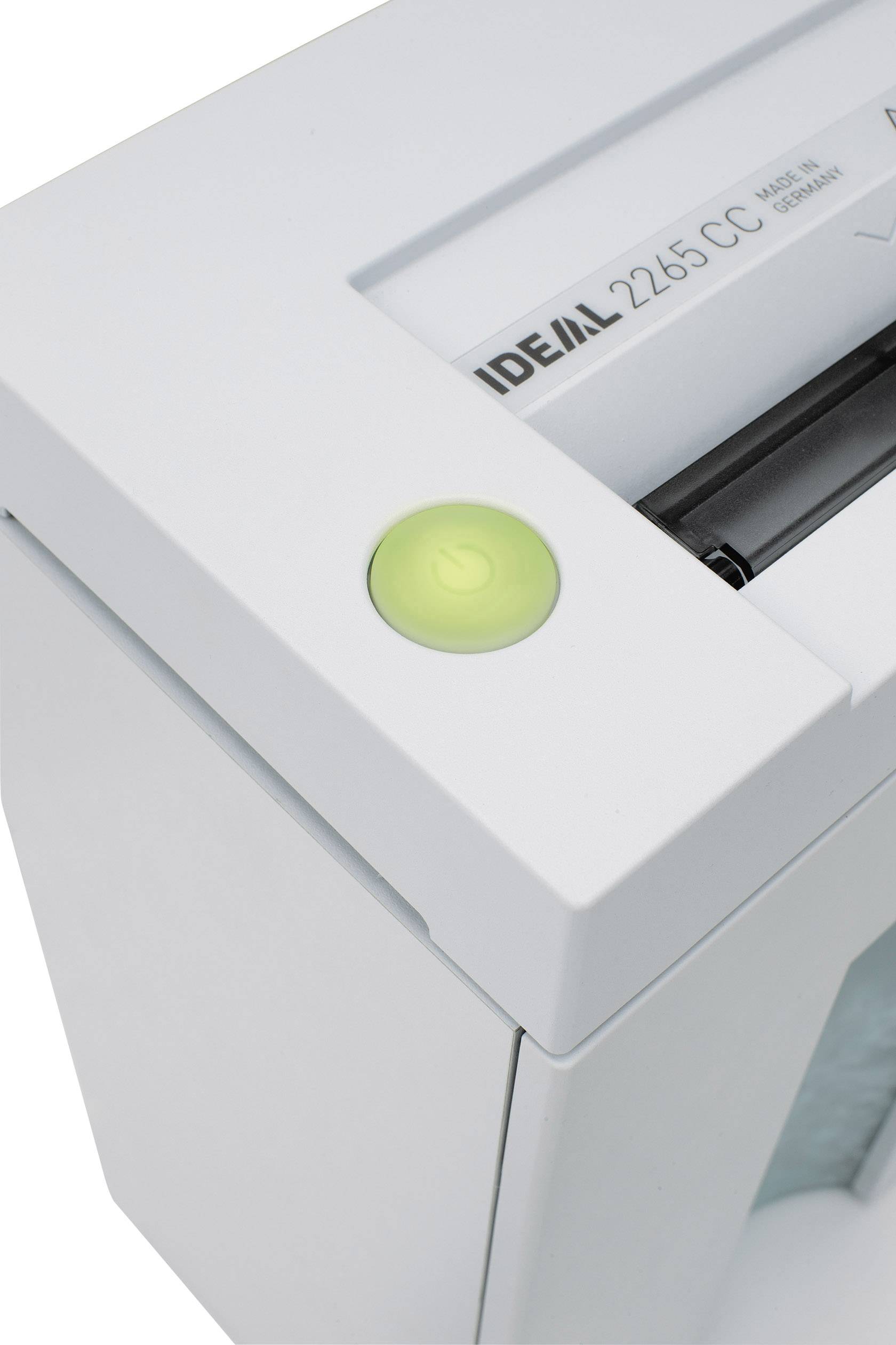 Un destructeur de documents avec un bouton marche allumé en vert, prêt à être utilisé.