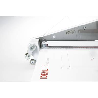 Machine à couper le papier IDEAL, coupe précisément le papier avec des repères de règle, la marque 'IDEAL' est visible sur le papier.