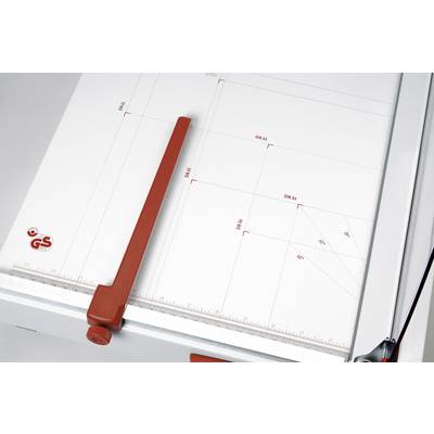 Une table à dessin avec une règle rouge, graduée pour les formats DIN. Elle présente des mesures et des lignes pour un positionnement précis du papier.
