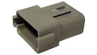 Objet rectangulaire gris en plastique avec connexion et fente, probablement un composant d'une connexion électronique.