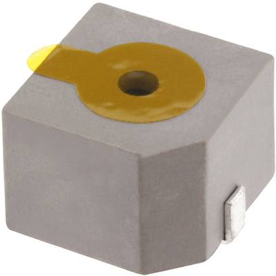 Un petit capteur électronique cubique gris avec une étiquette jaune sur le dessus, utilisé pour des détections ou des mesures précises.