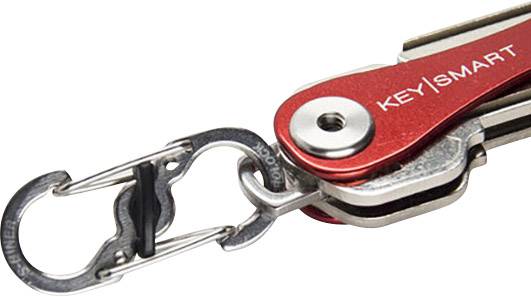 Un organisateur de clés rouge portant l'inscription 'KEY | SMART' présente une construction compacte pour ranger les clés, équipé d'un mousqueton.