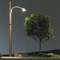Un réverbère éclaire une petite boîte et un arbre dans une scène nocturne sous un ciel sombre.