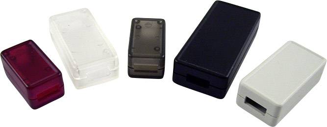 Cinq petits boîtiers en plastique de différentes couleurs : rouge, transparent, gris fumé, noir et blanc, disposés côte à côte.