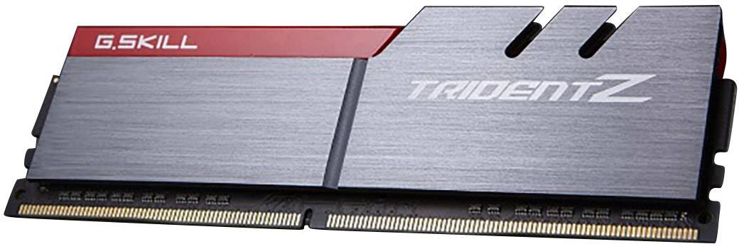 Un module RAM de G.Skill, modèle TridentZ, avec dissipateur thermique métallique et bande d'accentuation rouge. Conçu pour des performances élevées.