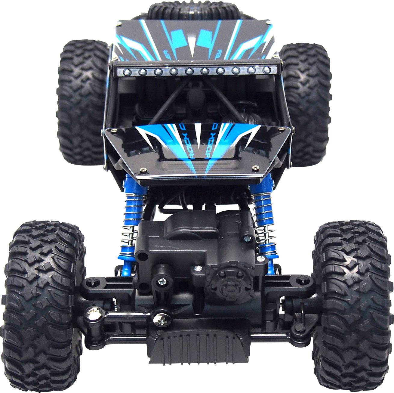 Une voiture télécommandée avec de grandes roues robustes et une carrosserie bleue, idéale pour des aventures tout-terrain.