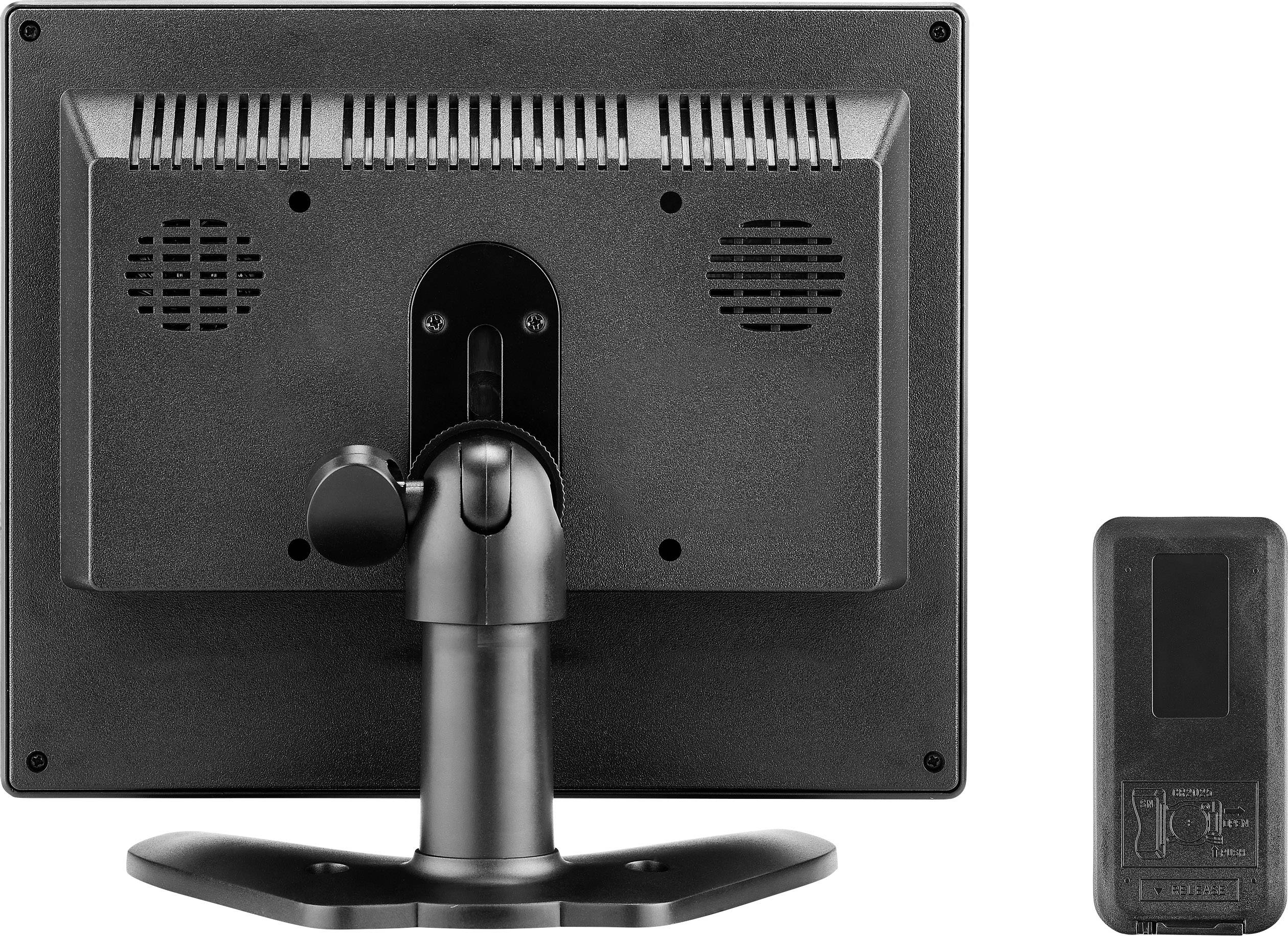 Dos d'un moniteur d'ordinateur avec socle, à côté se trouve une télécommande.