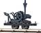 Ancien modèle de locomotive à vapeur sur des rails, présentant un design antique avec de grandes roues et une cheminée.