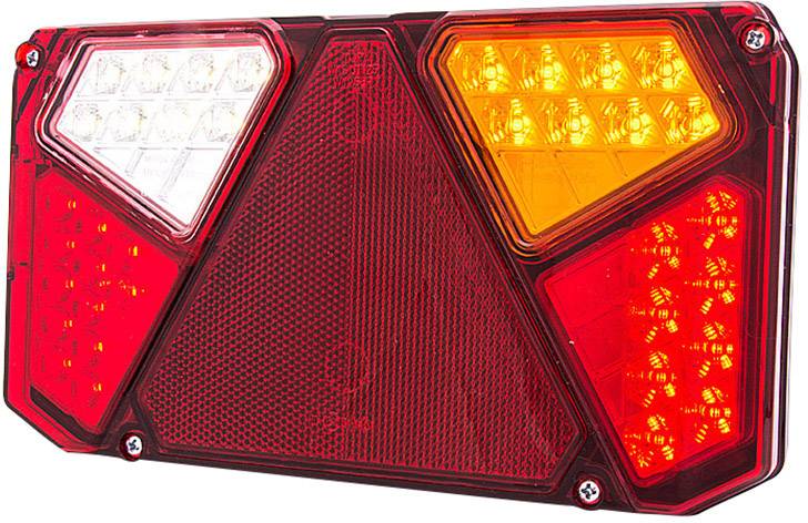 Feu arrière d'un véhicule avec un triangle rouge lumineux au centre, entouré de feux jaunes et blancs sur un fond sombre.