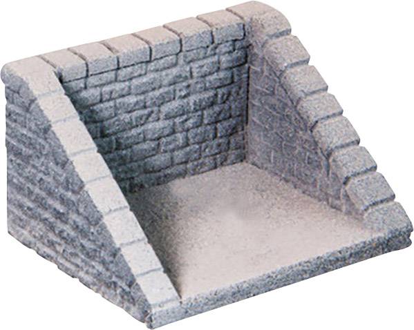 Un modèle miniature en pierre triangulaire avec deux murs inclinés et en gradins sur une base plate, représenté dans des tons de gris.