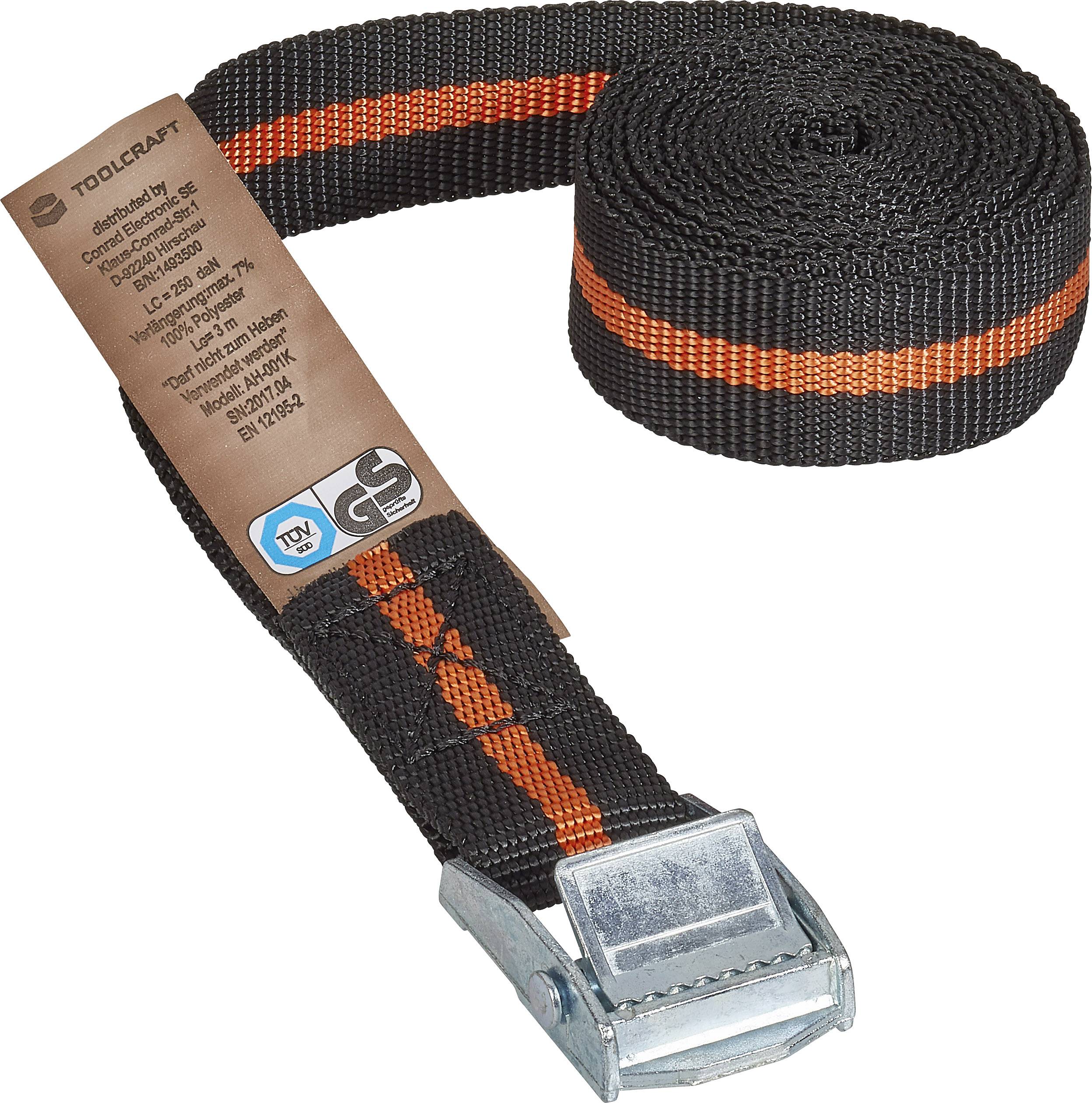 'Sangle de tension noire avec une bande orange et une boucle métallique, marquée du sceau GS et des informations du fabricant sur une étiquette.'