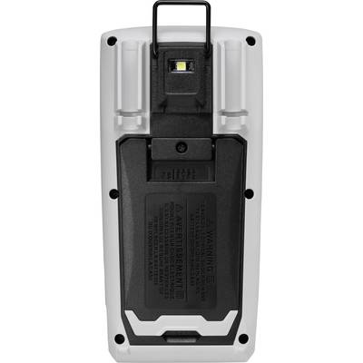 L'image montre le dos d'un appareil portable avec un compartiment à batterie et des avertissements. Une lumière LED est visible en haut.