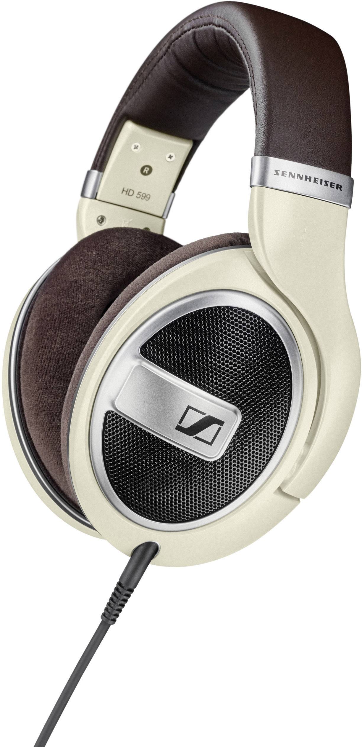 Grands écouteurs circum-auriculaires avec rembourrage marron et boîtier beige ; la marque est visible sur l'arceau. Adaptés pour le plaisir musical.