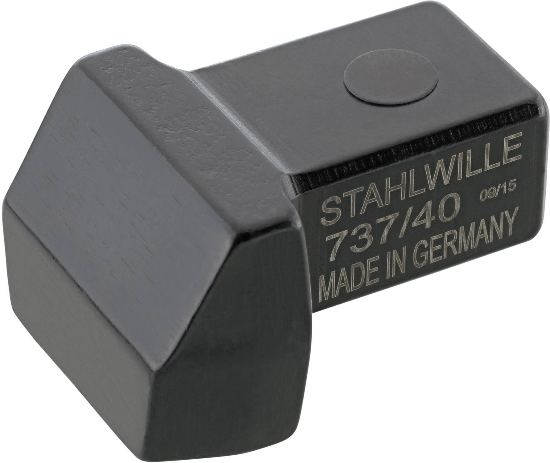 Bloc adaptateur noir portant l'inscription 'Stahlwille 737/40 Fabriqué en Allemagne'.
