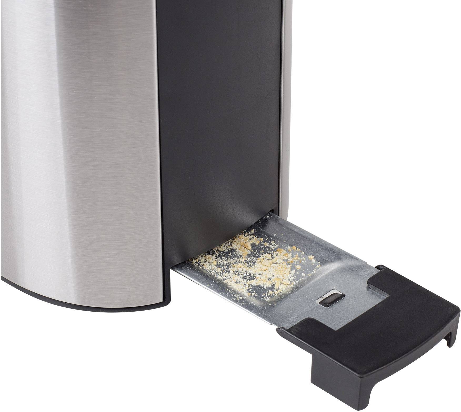 Un grille-pain en acier inoxydable avec un tiroir à miettes extractible, qui collecte les miettes de pain pour faciliter le nettoyage.