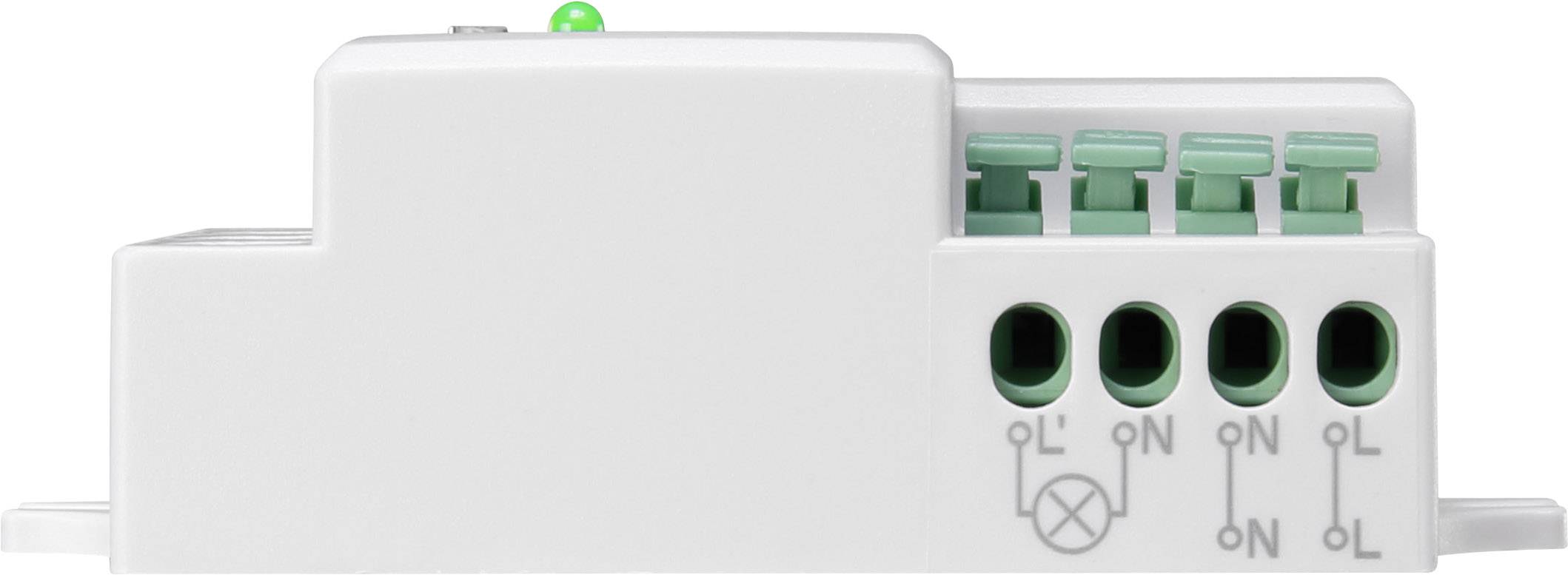 Un module électrique blanc avec des bornes et des symboles verts, utilisé pour le câblage et le contrôle des circuits électriques.