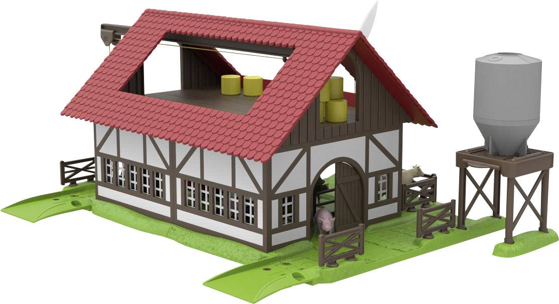 Un modèle d'une ferme avec un toit ouvert, des tuiles rouges, des tonneaux jaunes à l'intérieur, un silo à côté et un cochon dans l'enclos.